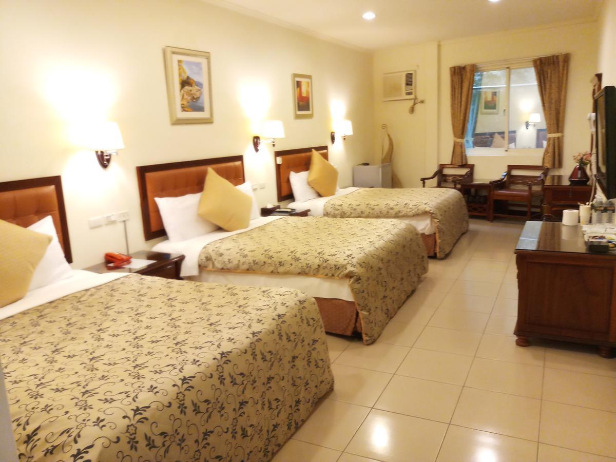 Puti Commercial Hotel Longtan Buitenkant foto