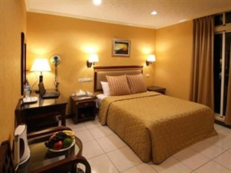 Puti Commercial Hotel Longtan Buitenkant foto